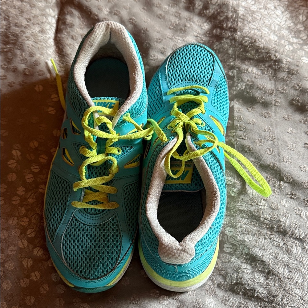 Nike Teal and Lime Sneakers. Worn but life is still in them.